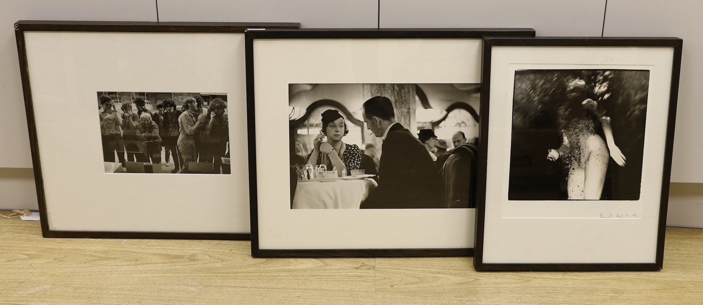 David Hick (contemporary photographer), three framed photographs, topical subjects, one signed and dated ‘92, largest 35 x 32cm